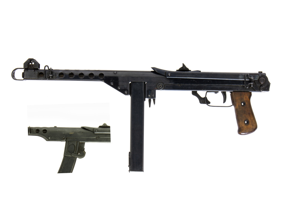 На фотографии KP m/44 и часть гнезда магазина ППС 43 На фотографии KP m/44 и часть гнезда магазина ППС 43