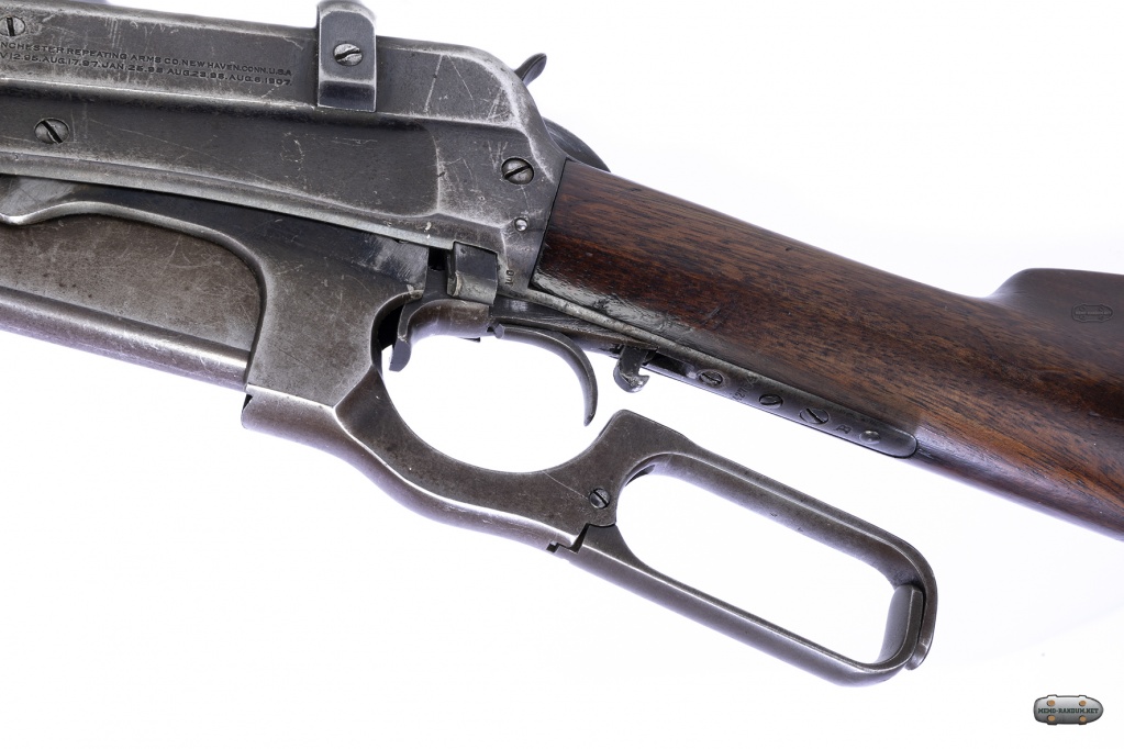 на Винчестере m1895_в скобе генри предусматривался рычаг-предохранитель предотвращающий случайное открытие затвора