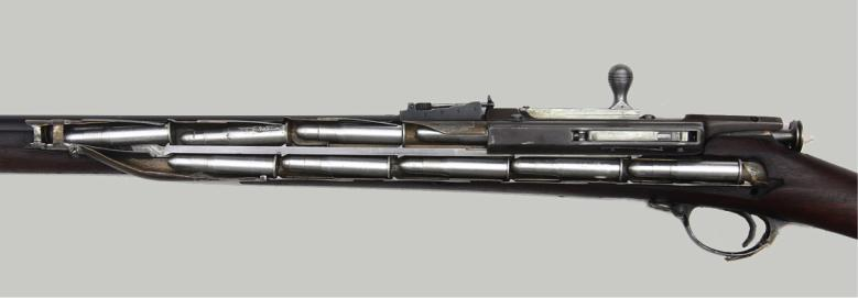 Ил. 2. Магазин модели 1884 г. емкостью девять патронов (вид изнутри) Ил. 2. Магазин модели 1884 г. емкостью девять патронов (вид изнутри)